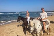 Riding along the beach 