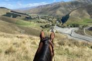 Riding atop a horse 