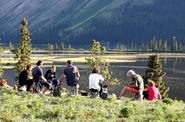 A group of tourists by the lake