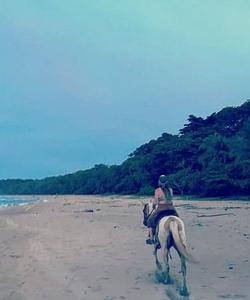 Riding along the beach 