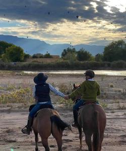 Riders holding hands 