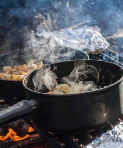 Cooking over the campfire 