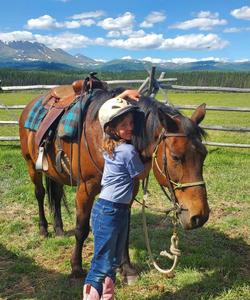 Getting acquainted with horses at the ranch 