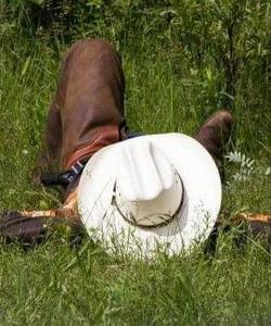 Rider chilling on the grass 