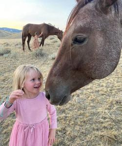 Kid with a horse 