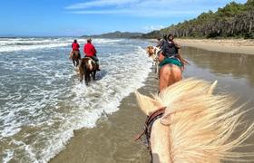 Riding along the beach 