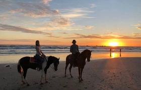 Riding along the beach 