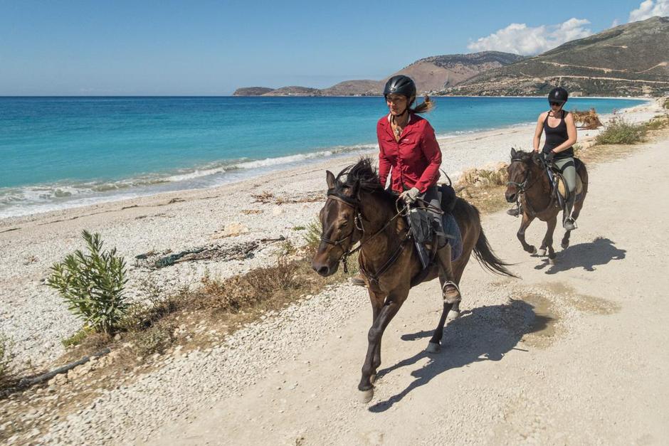 Horseback riding on the beach of Albania